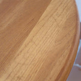 table basse ronde baumann vintage teck blond piètement tulipe scandinave Svend Dyrlund tripode