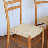 paire 2 chaises scandinaves paillées paillage bois clair vintage danois pieds compas canné cannage corde cordée 70